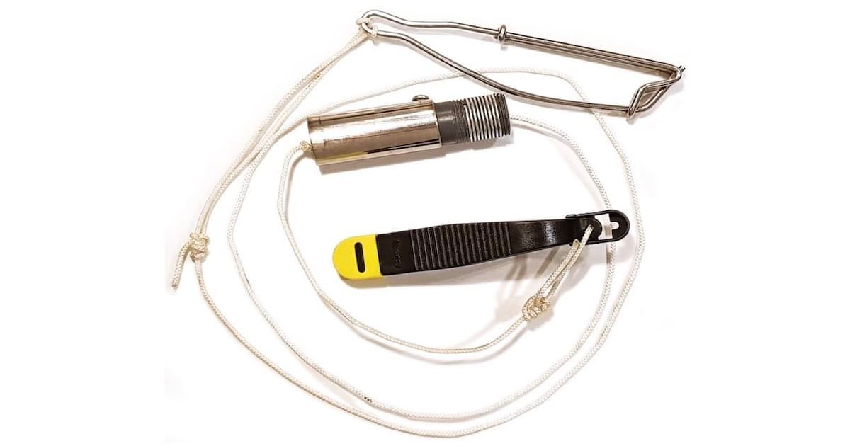 Fishing lure accessory set including a metal clip, a flashlight, and a yellow and black lanyard for securing gear.