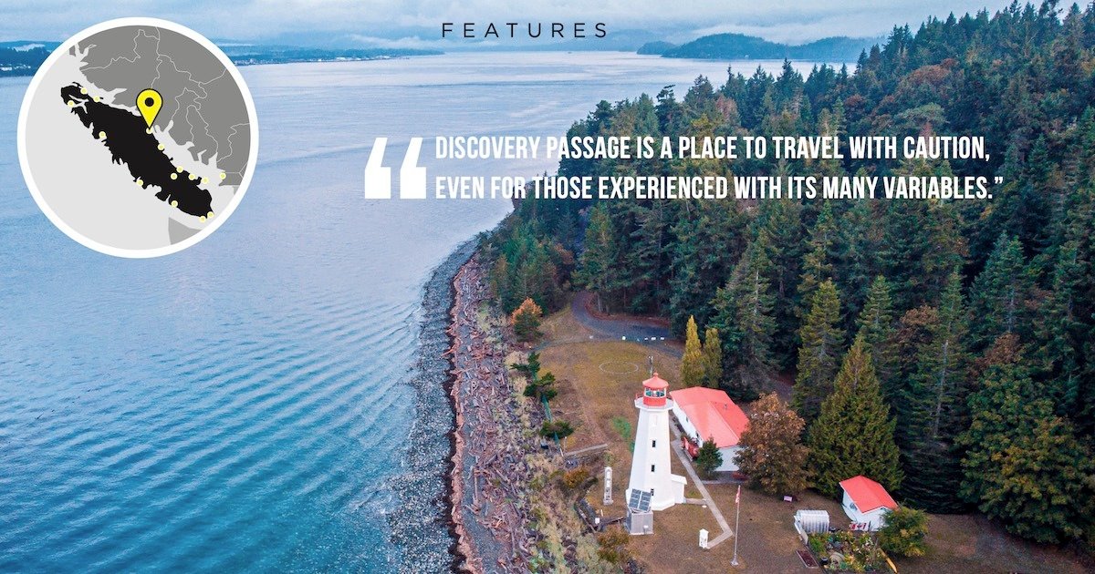 A lighthouse situated on the shore of Discovery Passage, surrounded by trees and water, with a map inset indicating its location.