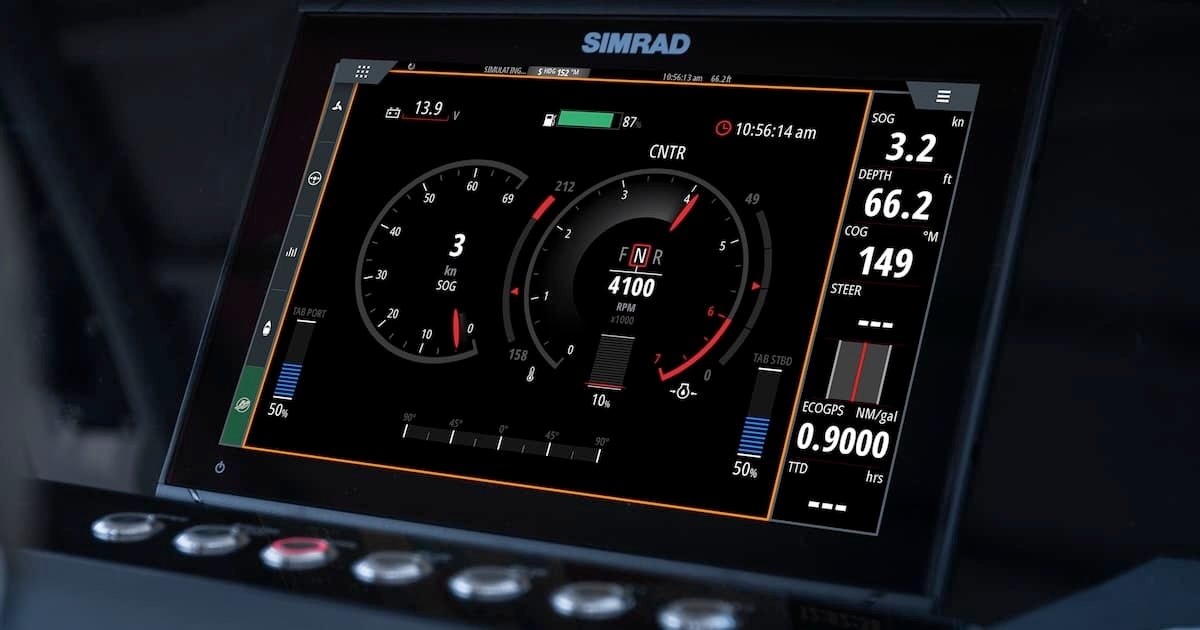 Digital display screen showing navigation and engine data with gauges for speed, depth, and steering on a marine instrument panel.