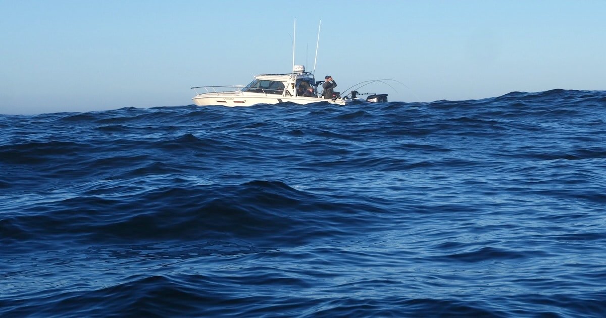 boat on a wavy sea on the west coast of Vancouver Island